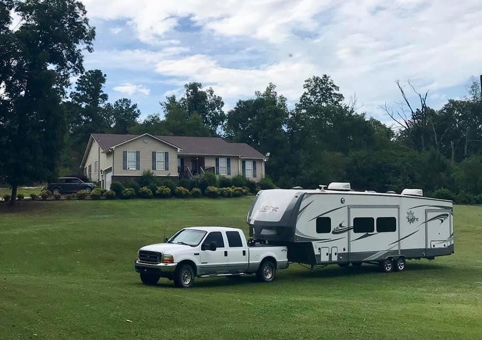 Replacement photo: Open Range Light fifth wheel with tow vehicle
